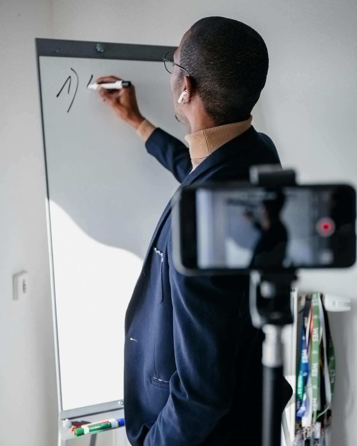 Teacher preparing a lesson with phone support