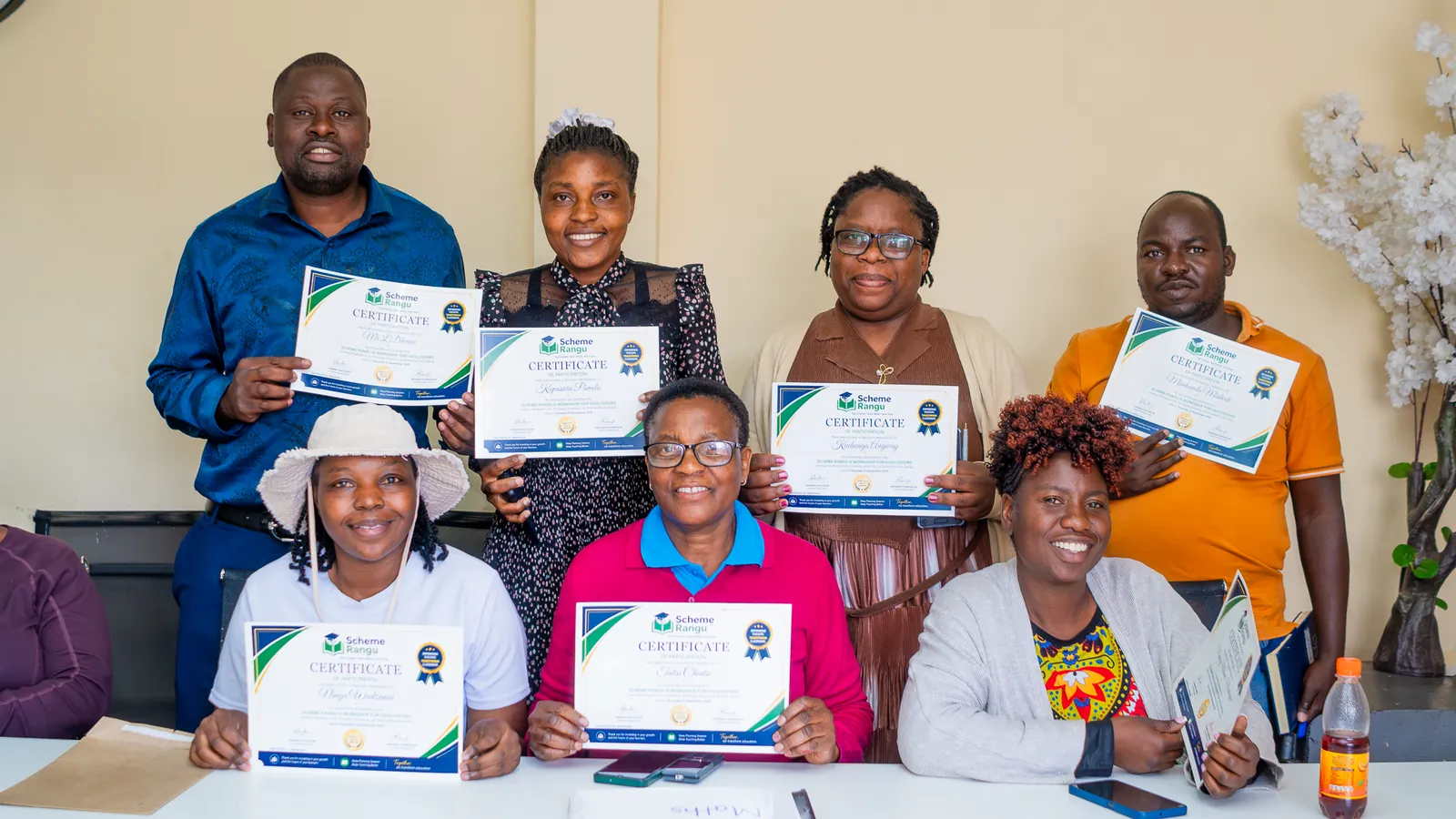 Harare workshop participants celebrating with their certificates