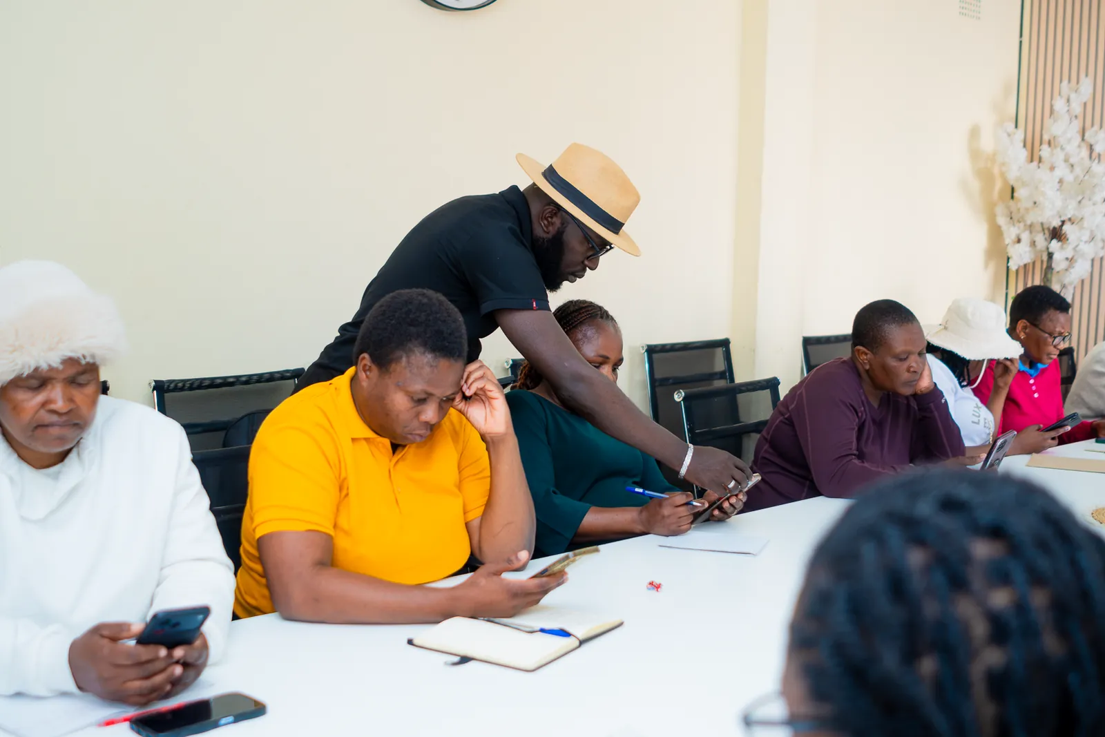 Educators receiving individual guidance at the Harare workshop