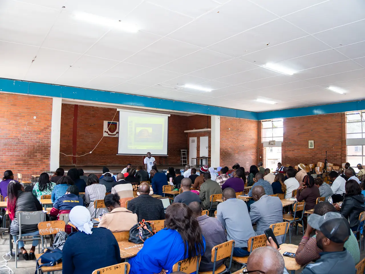 Teachers gathered in a hall for a Scheme Rangu workshop in Mutare